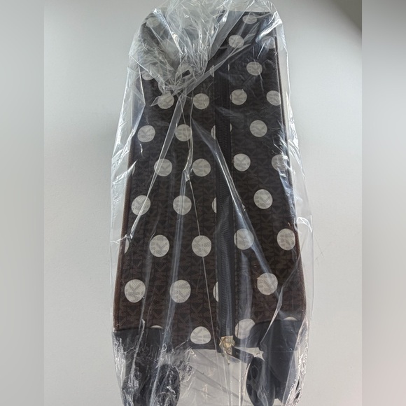 MICHAEL KORS  Small Polka Dot Signature Logo Suitcase
$898 OUT OF STOCK - Picture 12 of 12